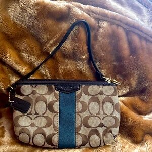 Coach Signature wristlet Brown with Dark Blue detail strip